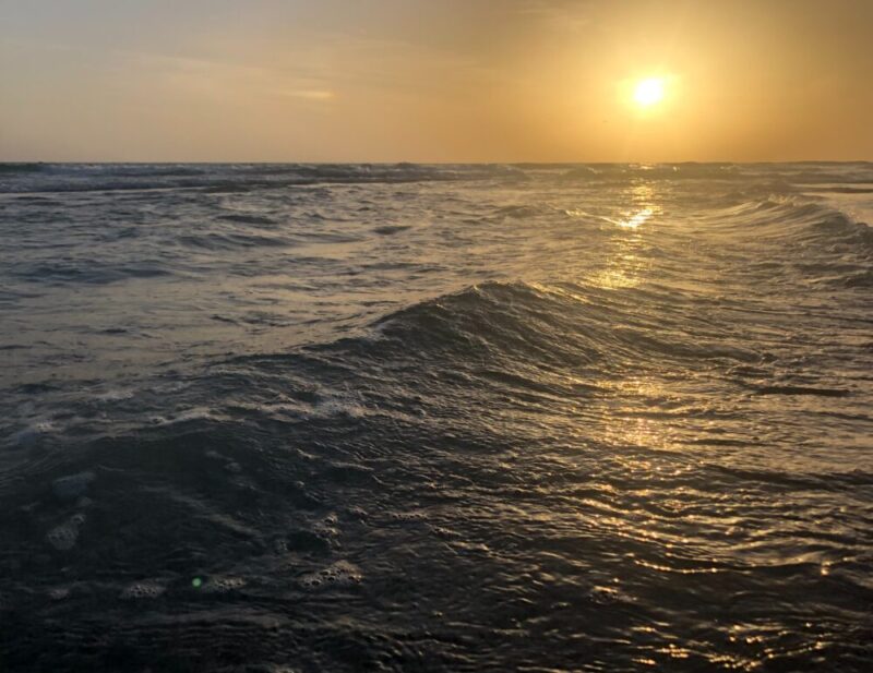 gray sea below sunrise view photo