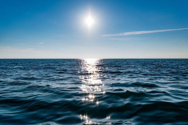 sea horizon sun sunlight sky ocean reflection